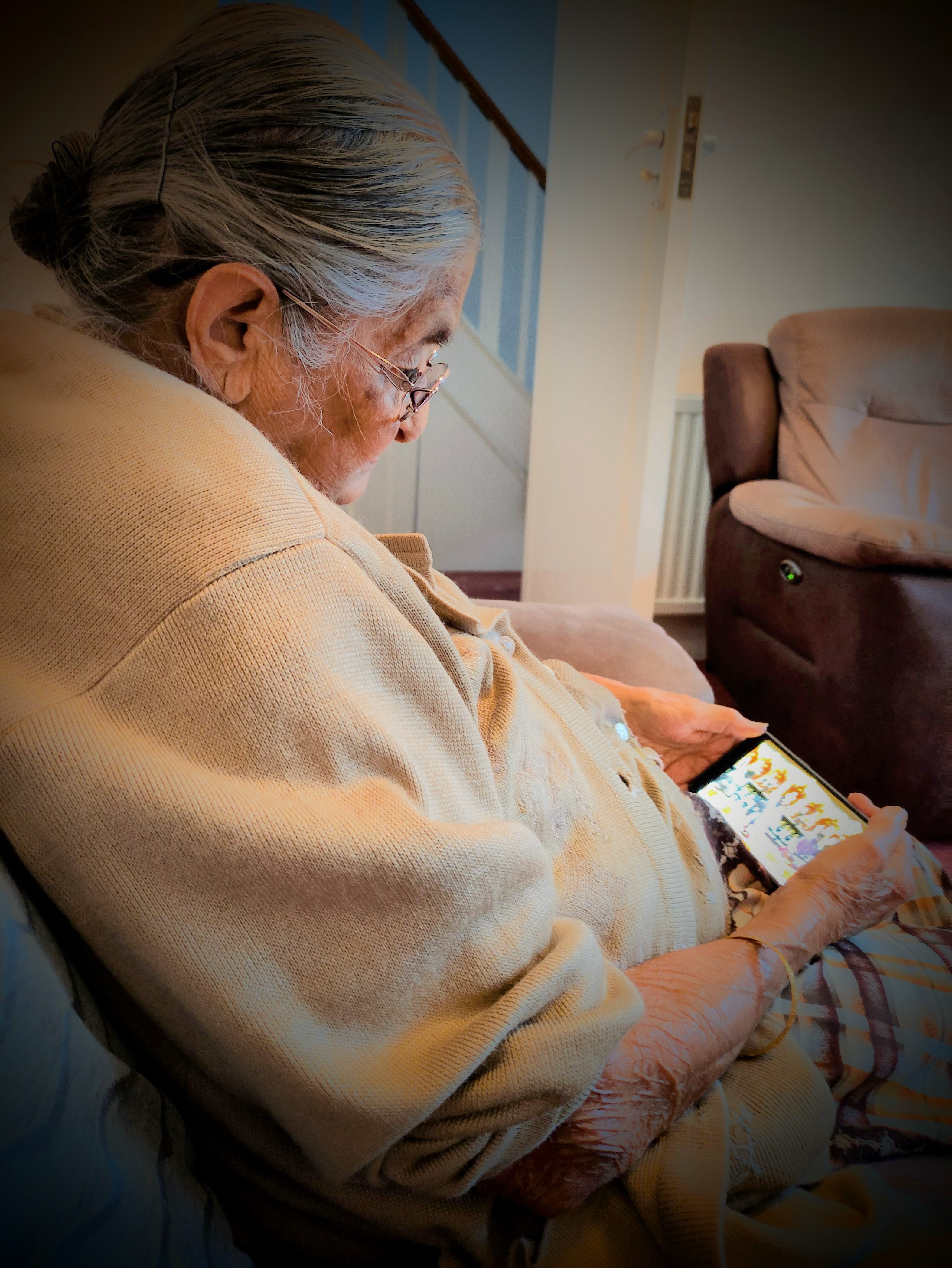 my grandma unwittingly watching something on her phone.