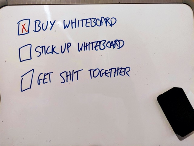 Whiteboard with stupid todo list